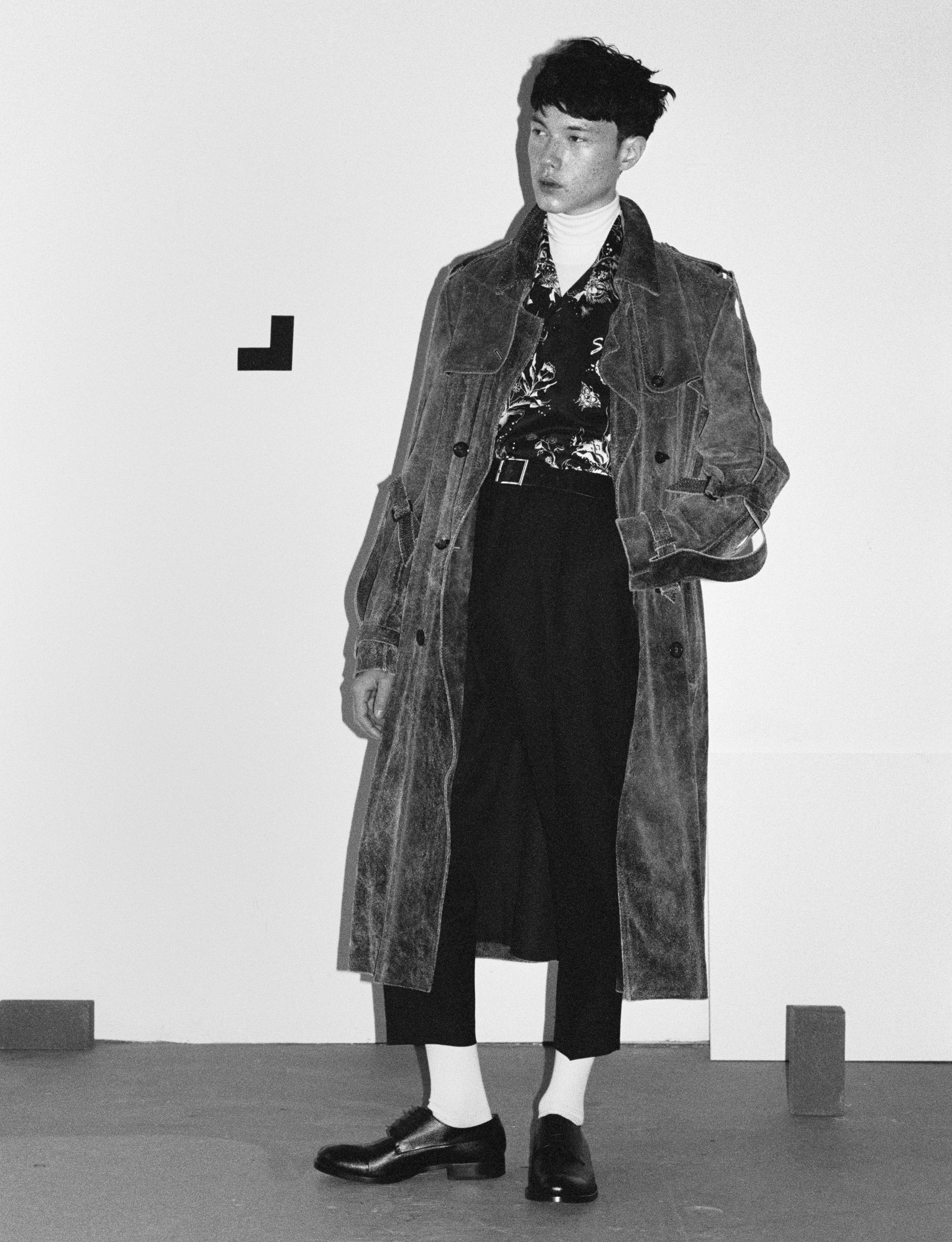  Raf Simons from David Casavant Archive Leather trench, Stylist’s Own Turtleneck, Givenchy at mrporter.com Camp-Collar Printed Shirt, Mr P. at mrporter.com Tapered Pleated Worsted-Wool Trousers Vintage belt, Stylist’s Own Socks Giorgio Armani Shoes