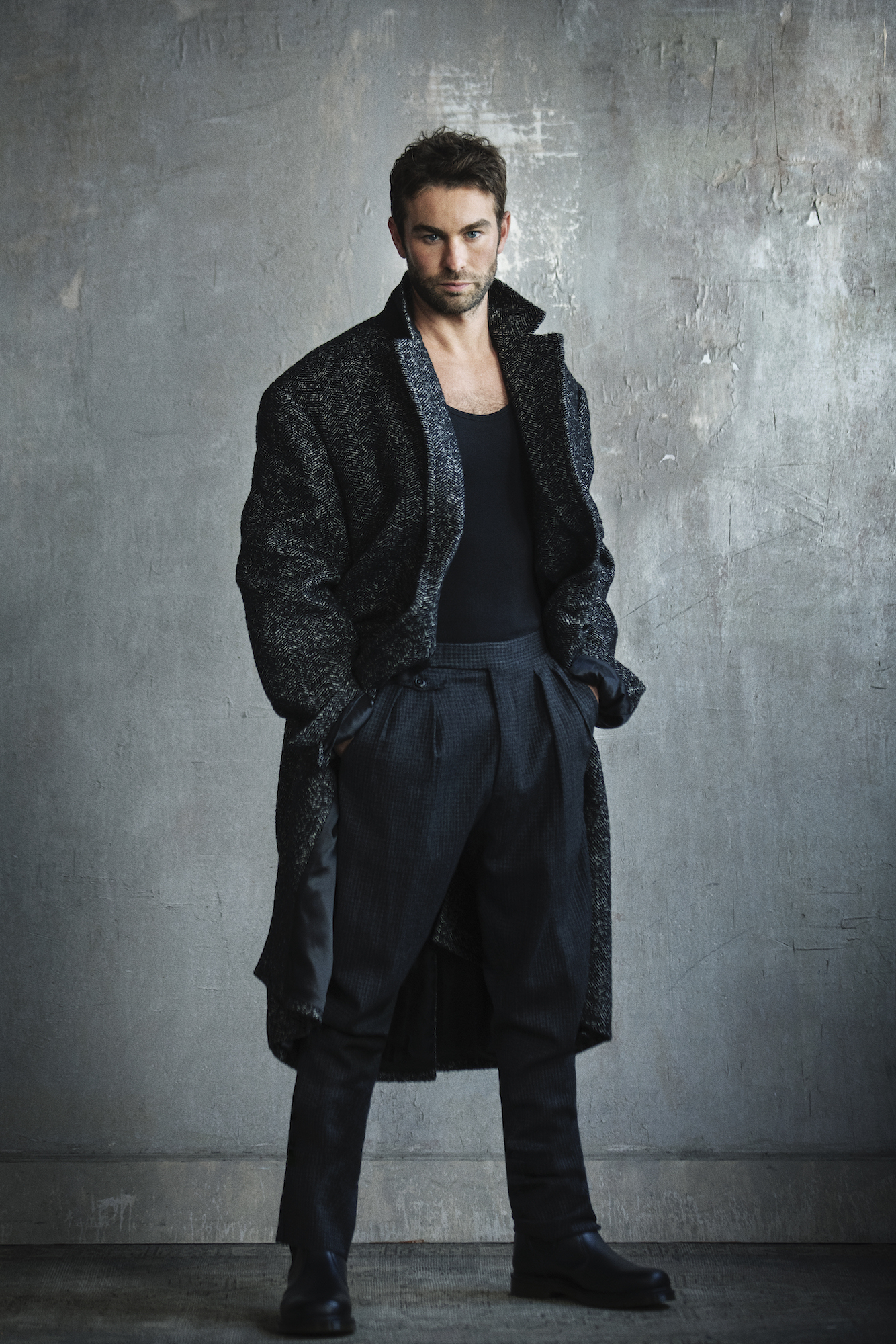  Chace wears pants Canali 1934, coat Coach, boots Dr. Martens and top stylist’s own.