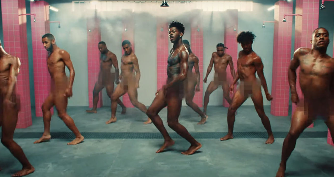 Lil Nas X and his fellow inmates have a dance break in the shower, fully nude
