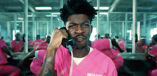 Lil Nas X answers the phone in prison