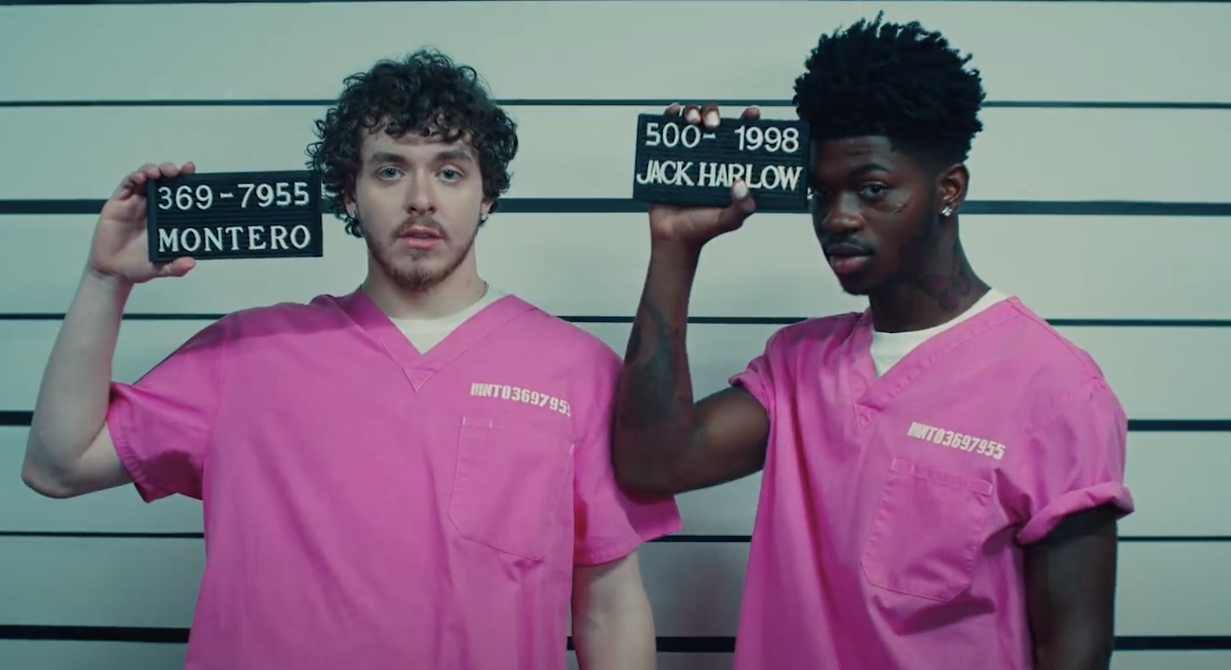 Lil Nas X and Jack Harlow in front of a police lineup