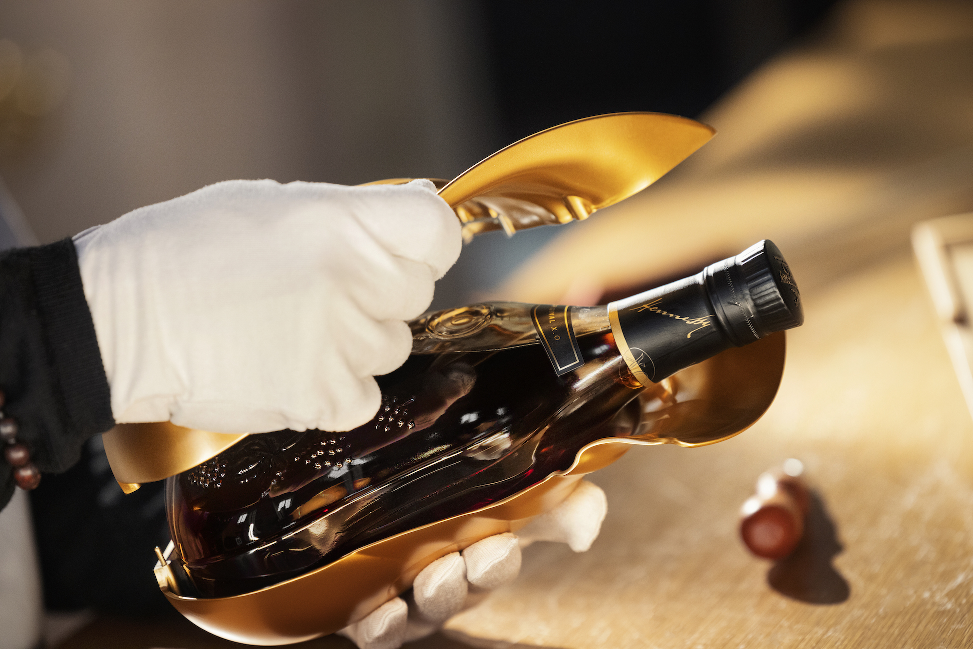 Kim Jones creates glass of cognac in sneaker form for Hennessy